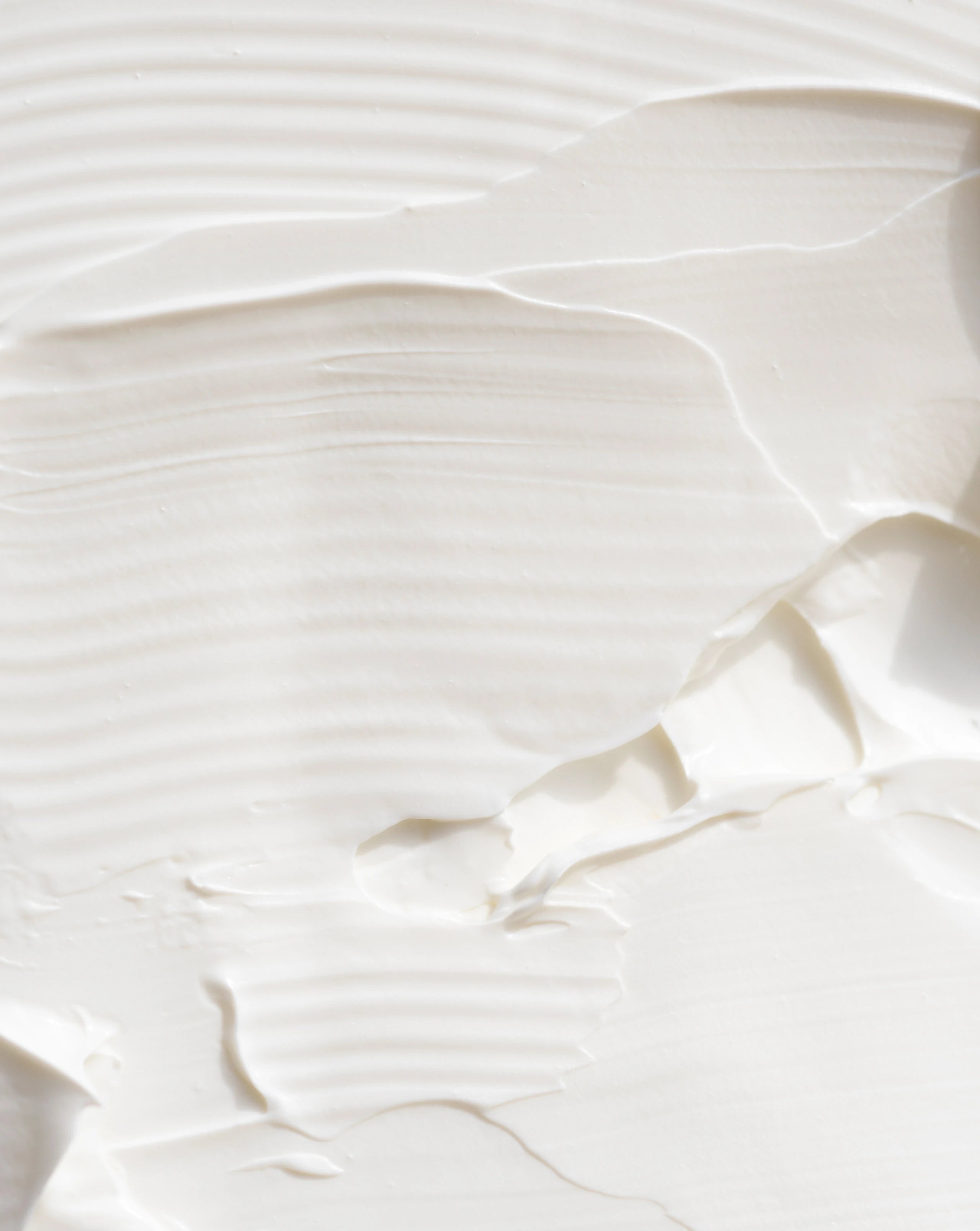 Swirl of thick white body butter cream