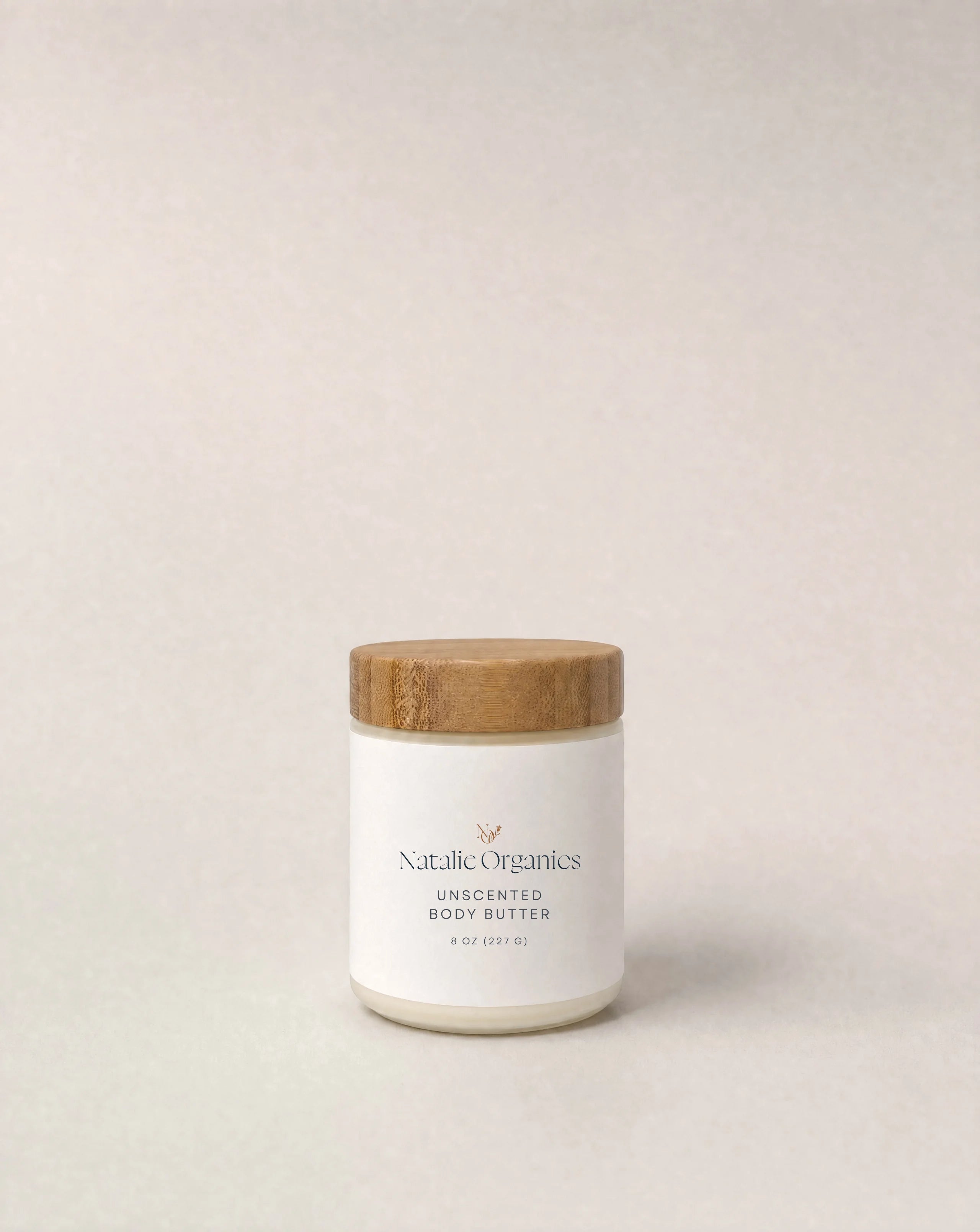 Unscented body butter jar with cork-style lid and white label