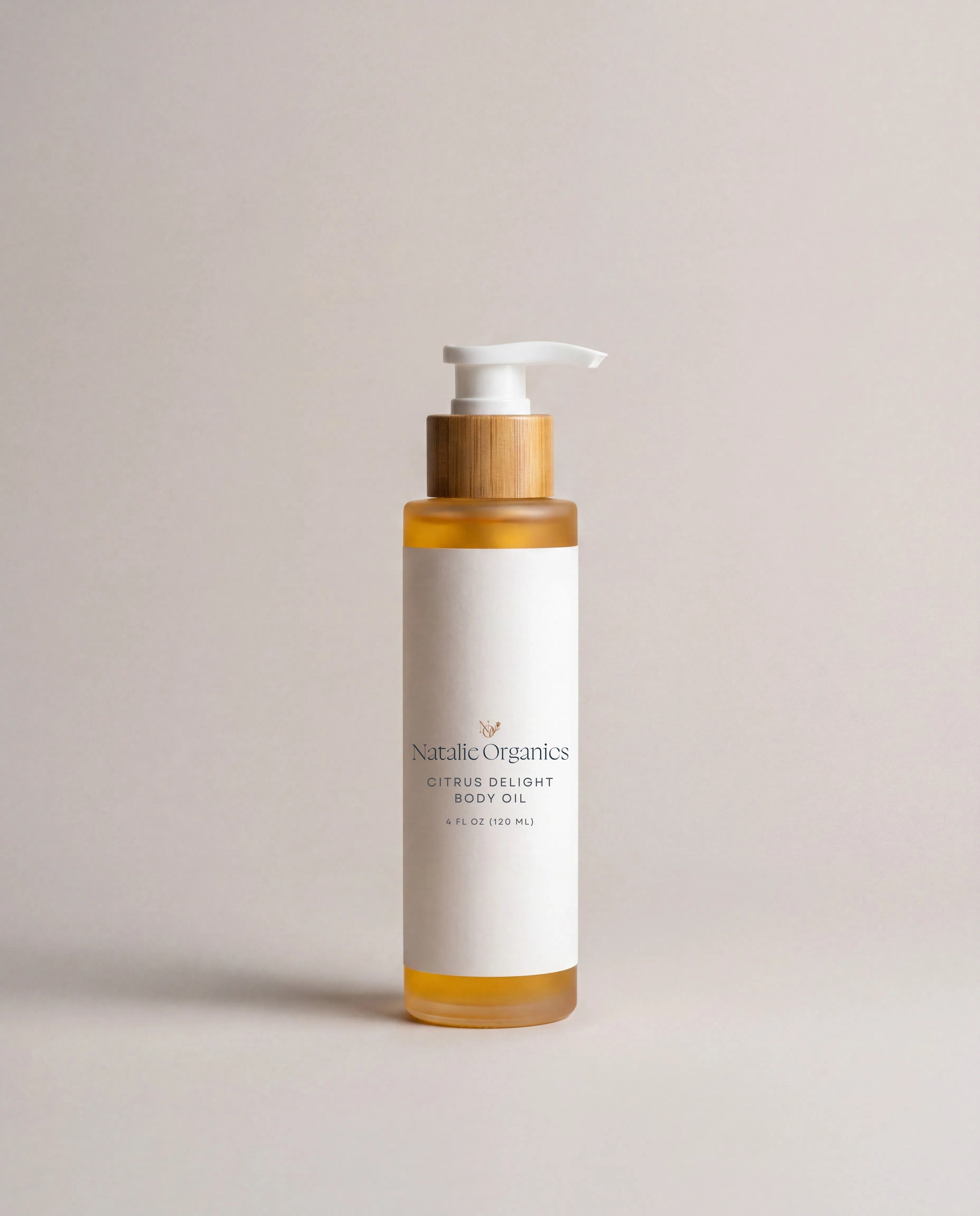 Body oil bottle with pump, amber label on white bottle