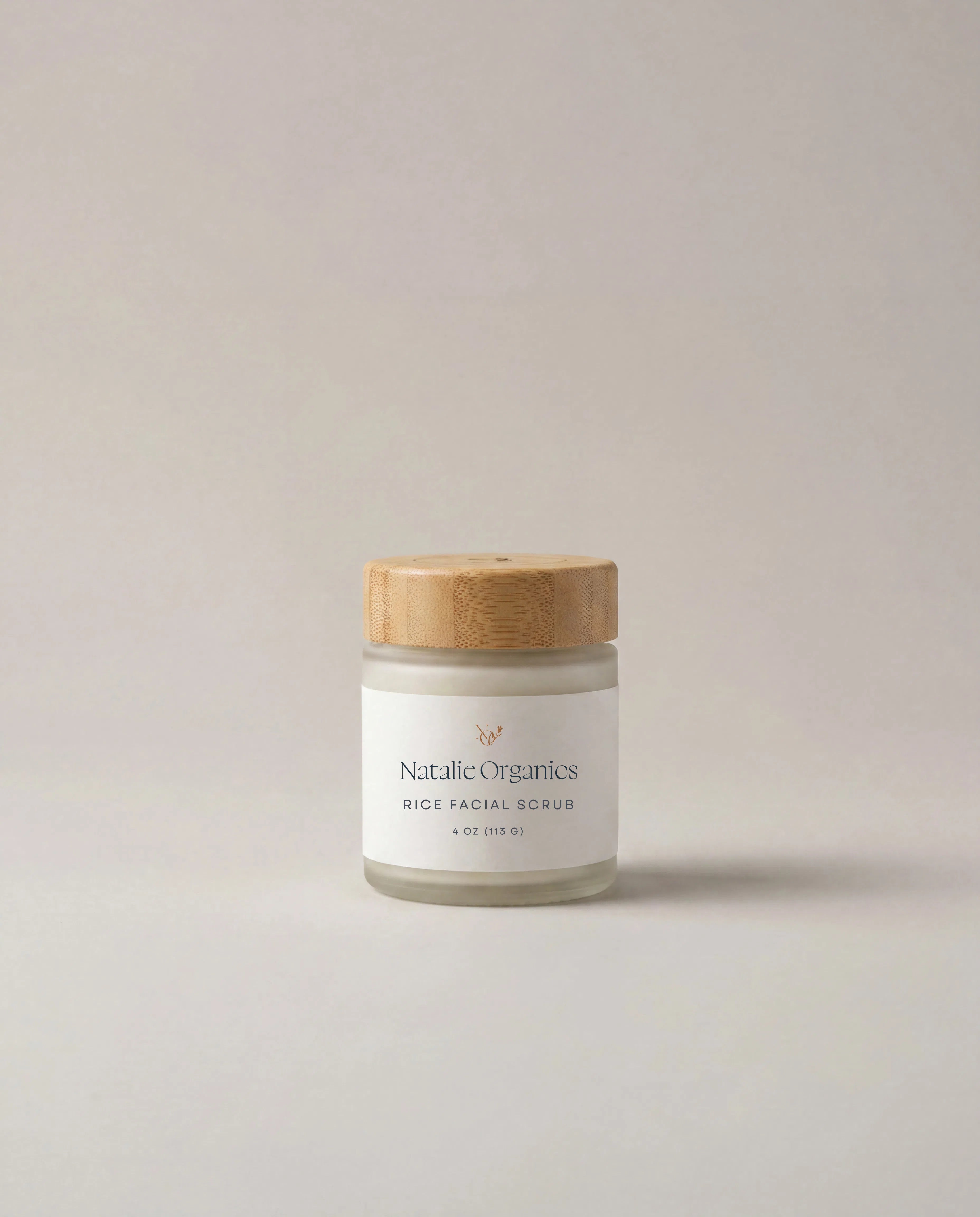 Rice facial scrub jar with bamboo lid and white label, Natalic Organics