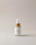 Niacinamide clarity serum bottle with pump and frosted white label