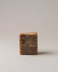 Sandalwood vanilla bar soap, mottled brown rectangular bar
