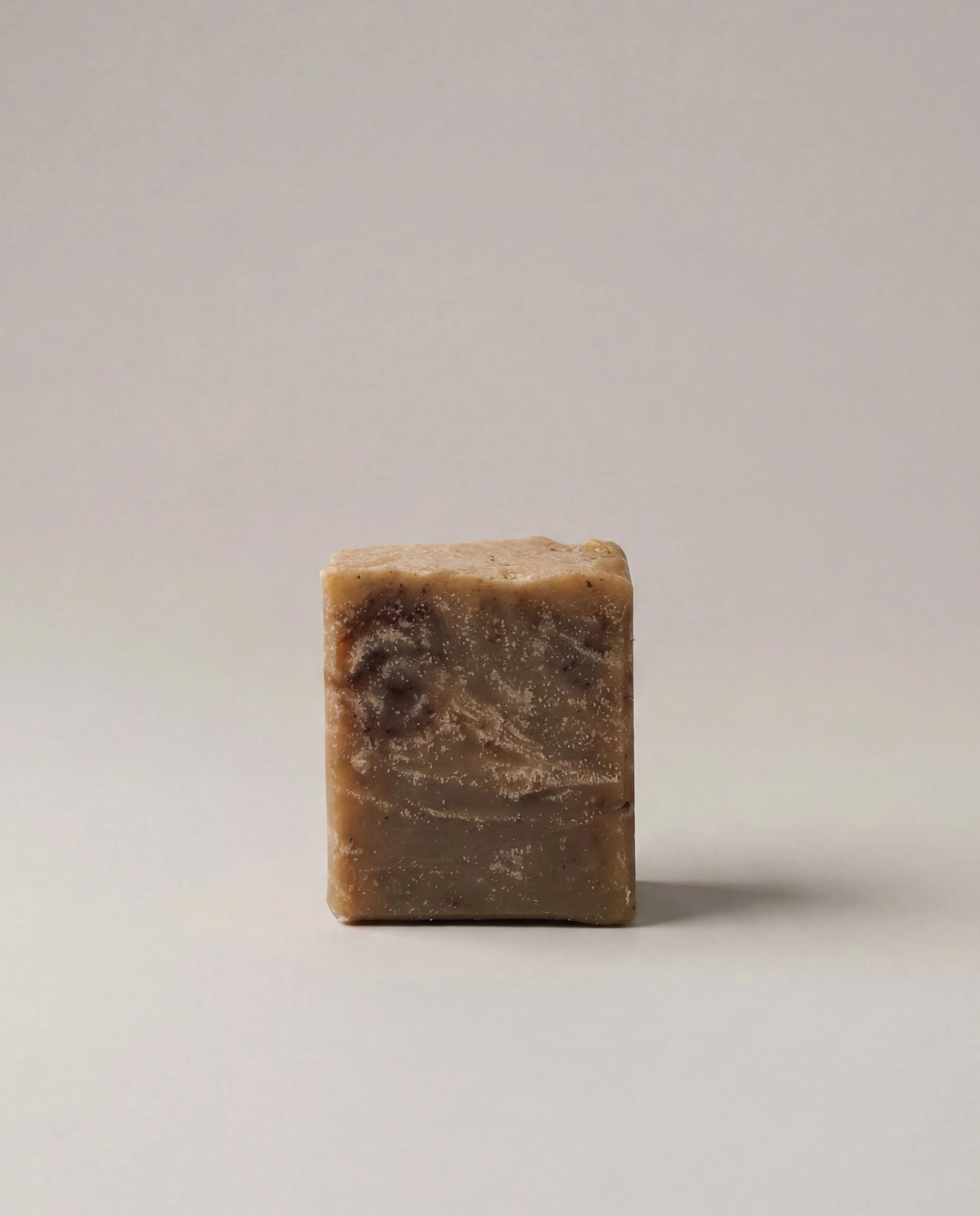Sandalwood vanilla bar soap, mottled brown rectangular bar