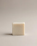 Tallow bar soap, pale cream rectangular block with smooth cut edges